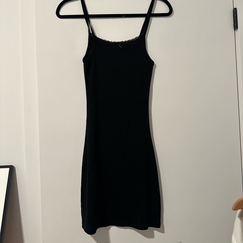 Brandy Melville black mini dress with bow and lace detail
